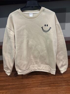 Cream Crewneck Sweatshirt with Smiley Graphic - Women's